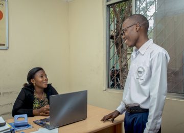 Assistant ESCO Speaking to a Student